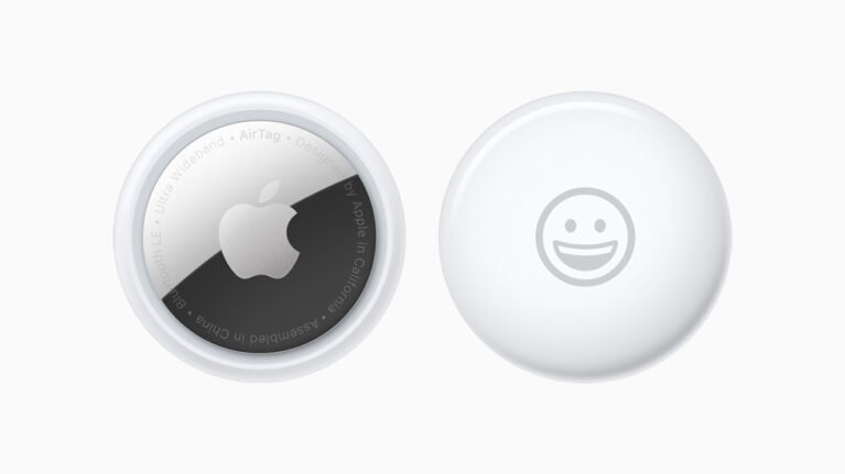 Front and back view of an Apple AirTag