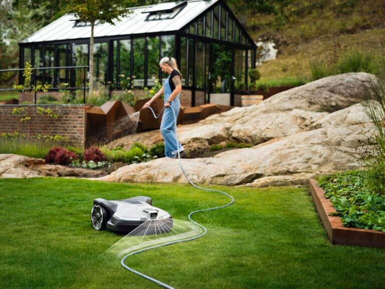 Husqvarna Automower 430V/450V NERA representative range press image with manufacturer navigation overlay; models and packages vary